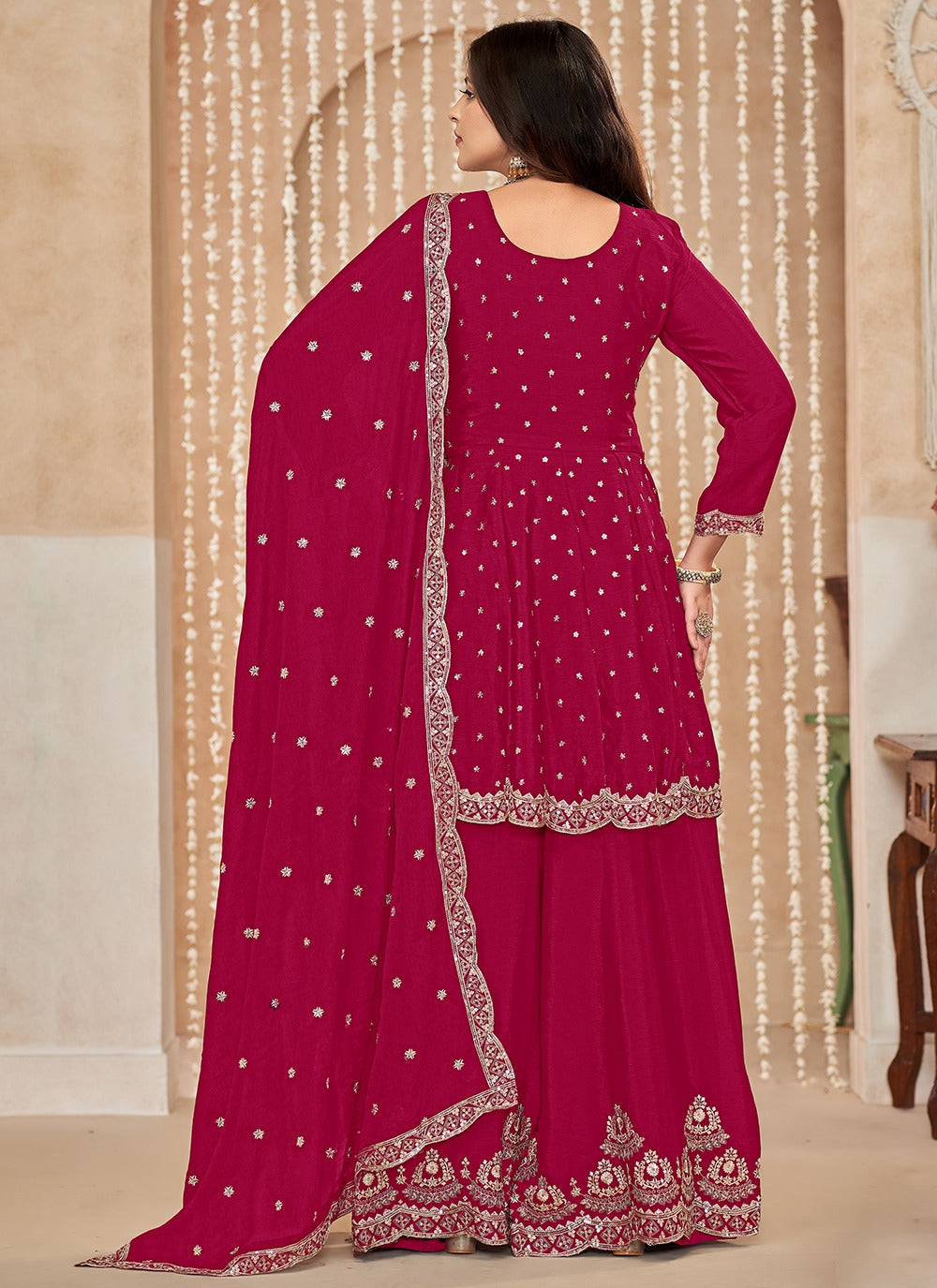 Women pink sharara suit for wedding