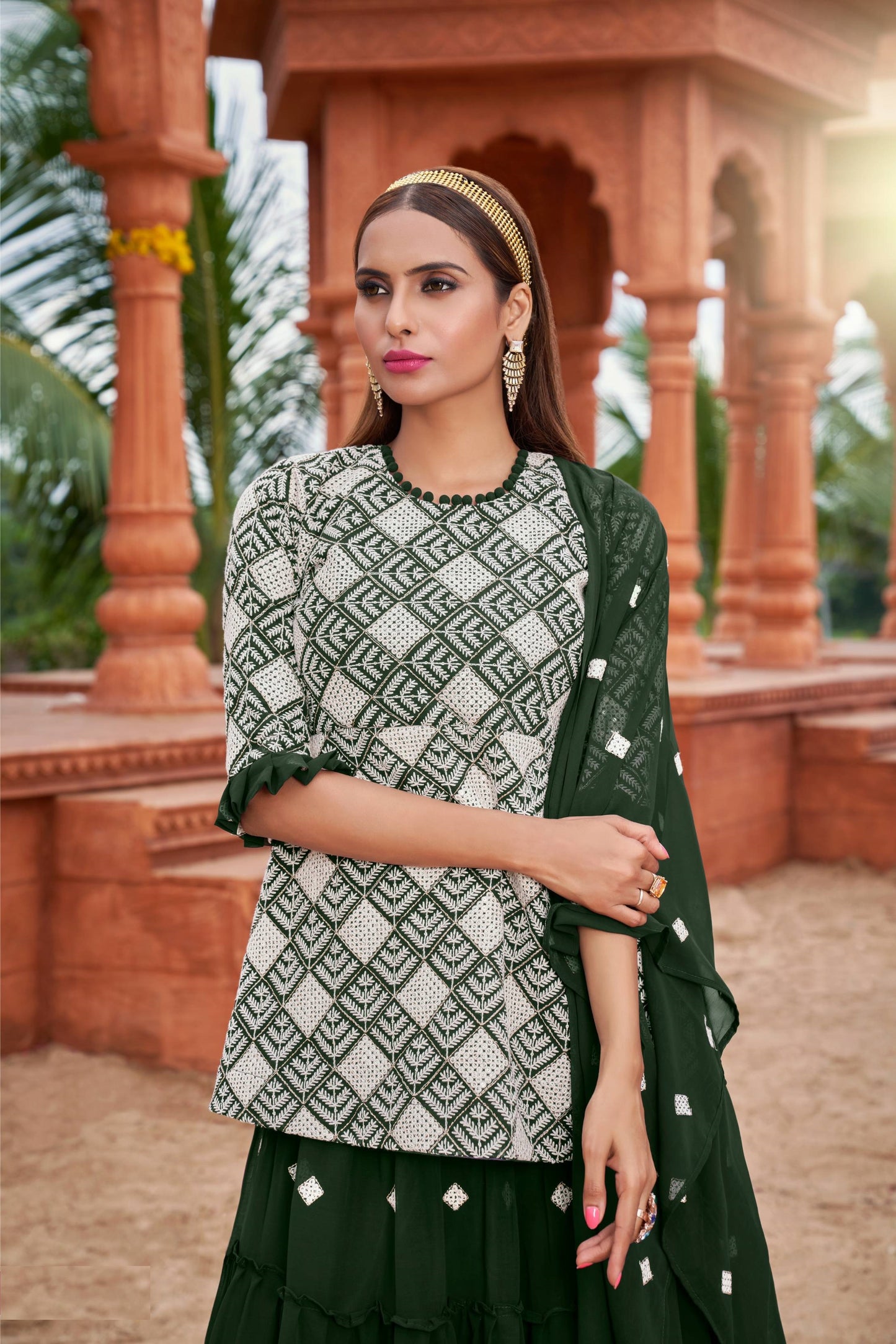 Green color georgette lehenga with top images