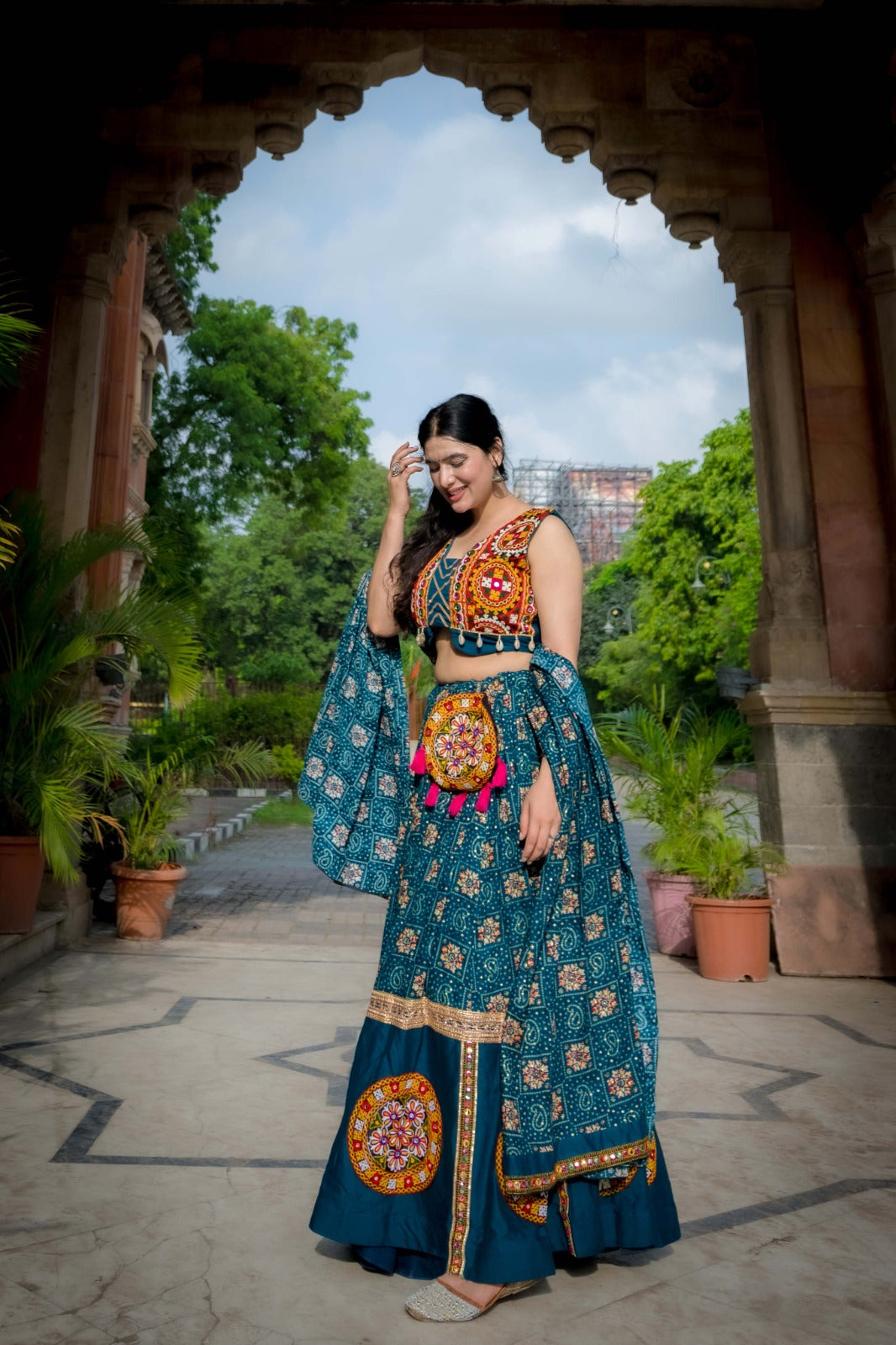 Teal color gamthi work ghagra choli