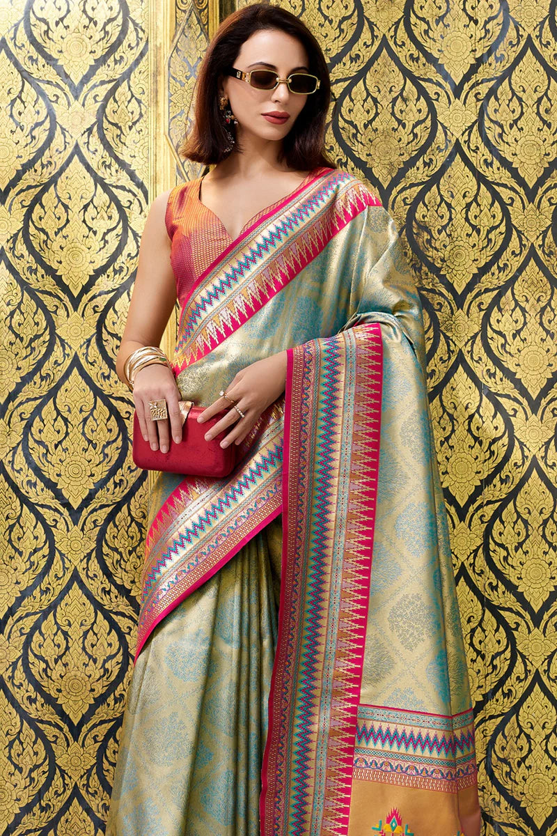 Green color tissue silk saree with blouse images
