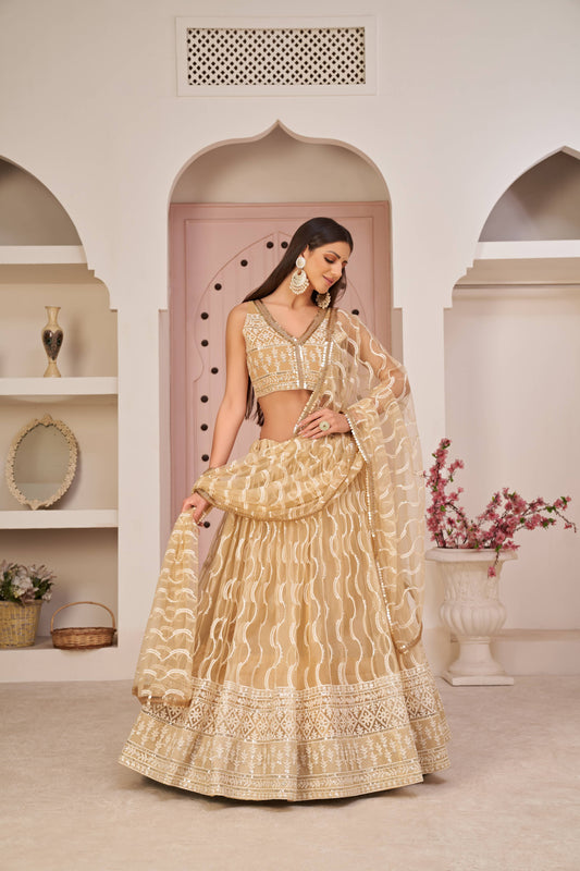 beige soft net party wear lehenga choli