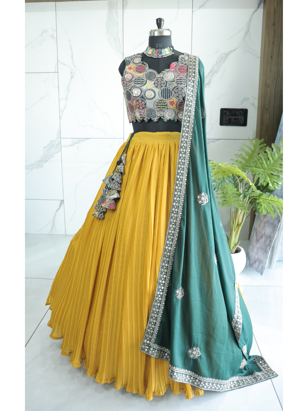 Yellow color georgette lehenga choli with blouse