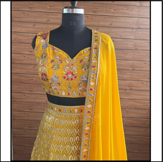 Yellow color georgette lehenga choli for wedding