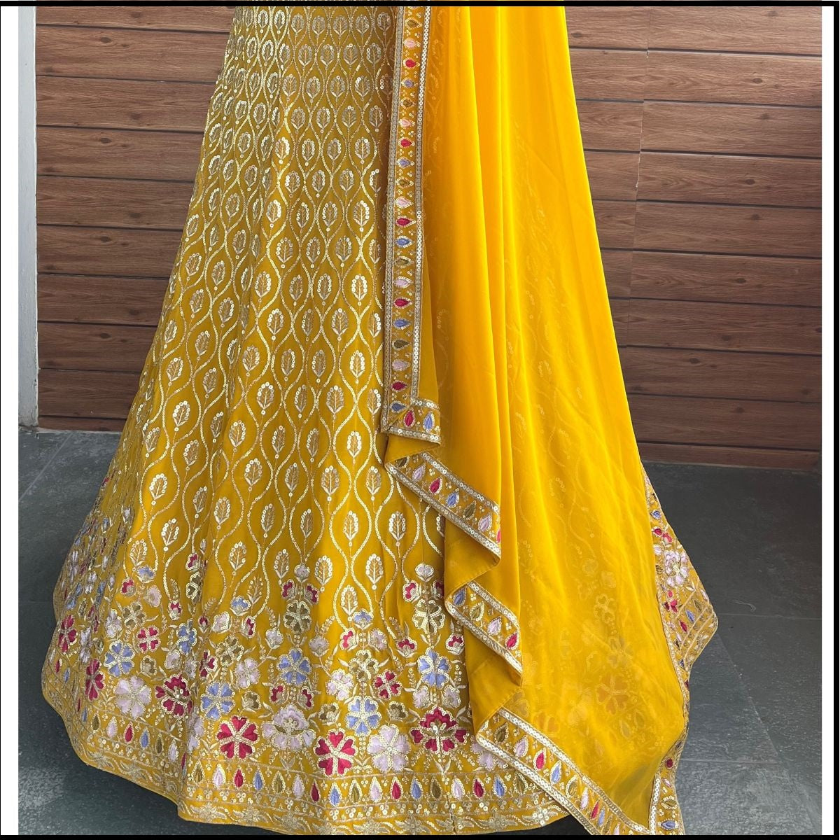 Yellow color georgette lehenga choli with dupatta images