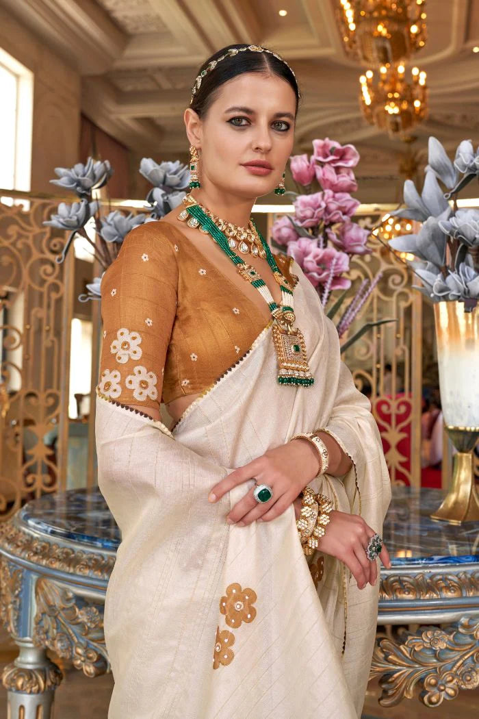 Beige color tussar silk hand touched work saree online