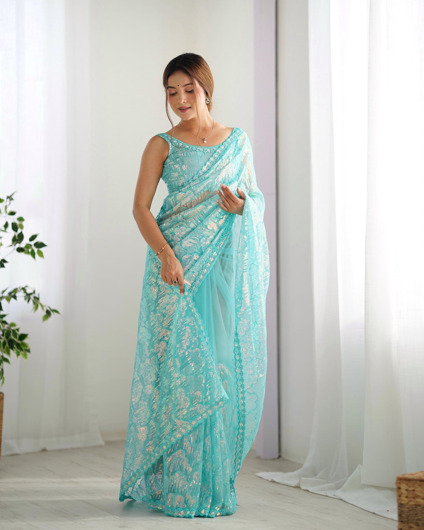 Sky blue color mono net saree for women price