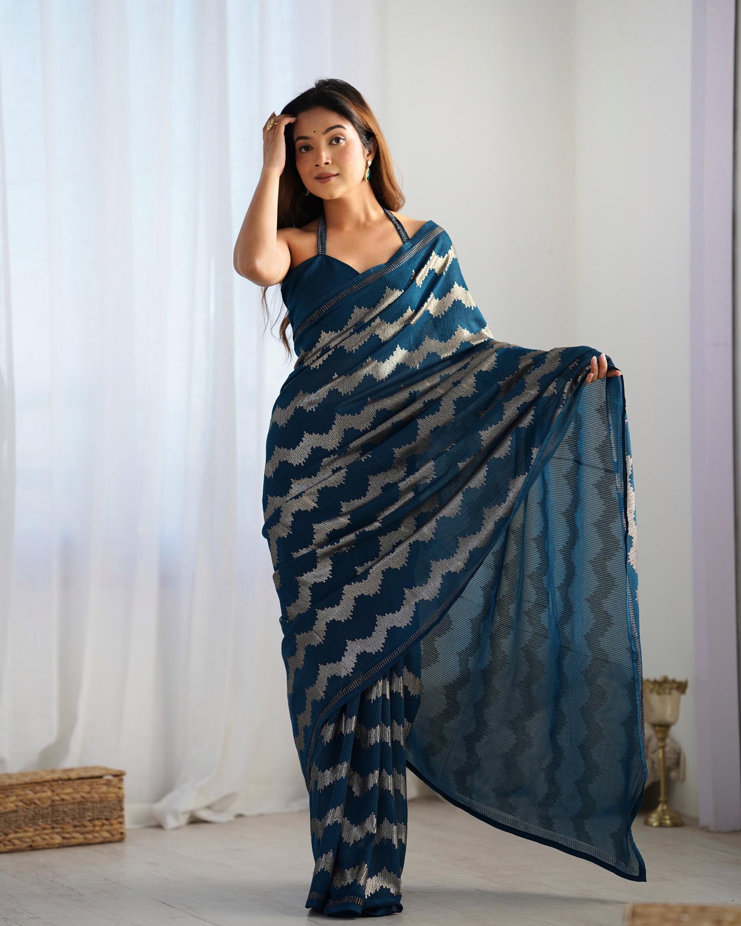 Teal blue color georgette saree price