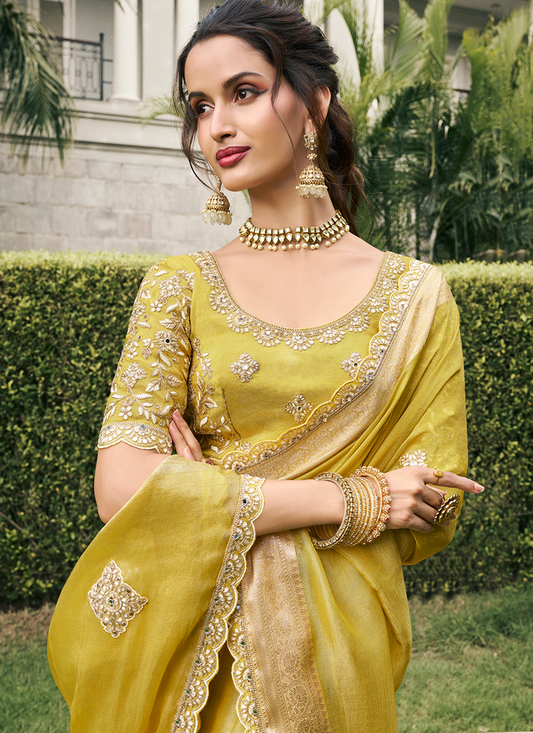 Yellow color tissue silk saree for women