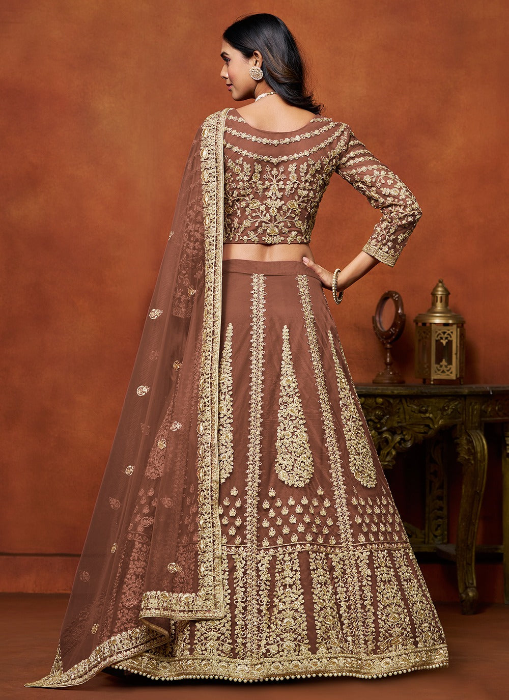 Brown color net lehenga choli with dupatta