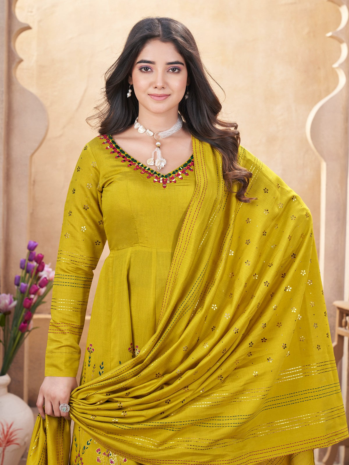 Yellow color roman silk sharara suit with dupatta