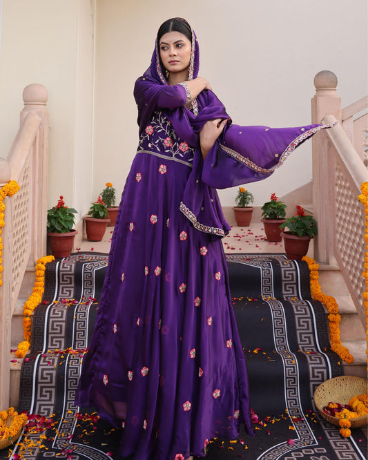 Purple color rangoli silk gown for wedding