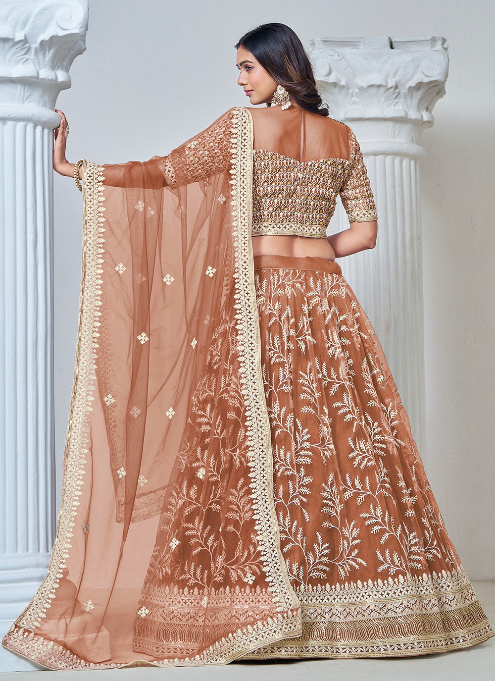 Brown color net lehenga choli for wedding