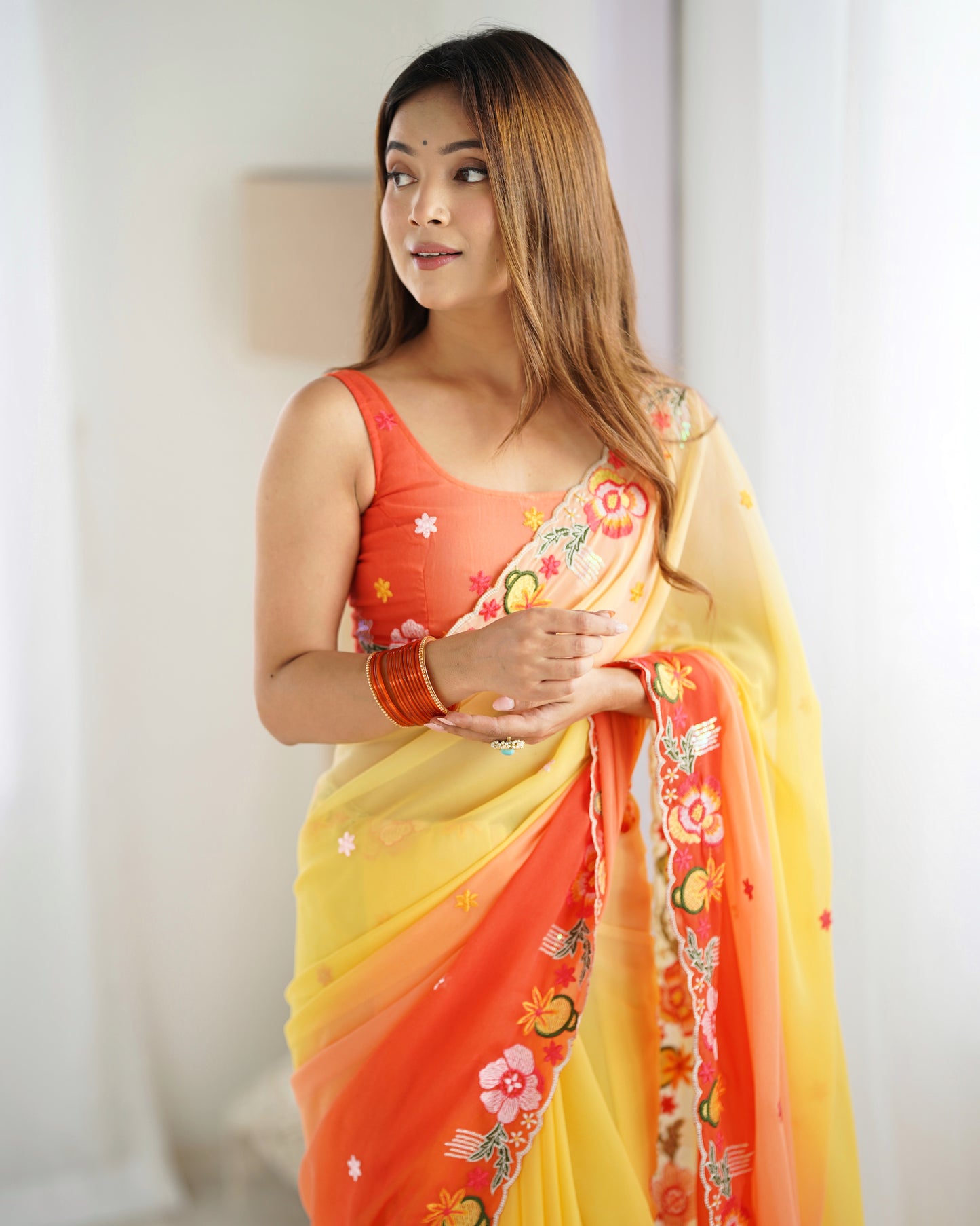 Yellow color georgette saree with blouse price