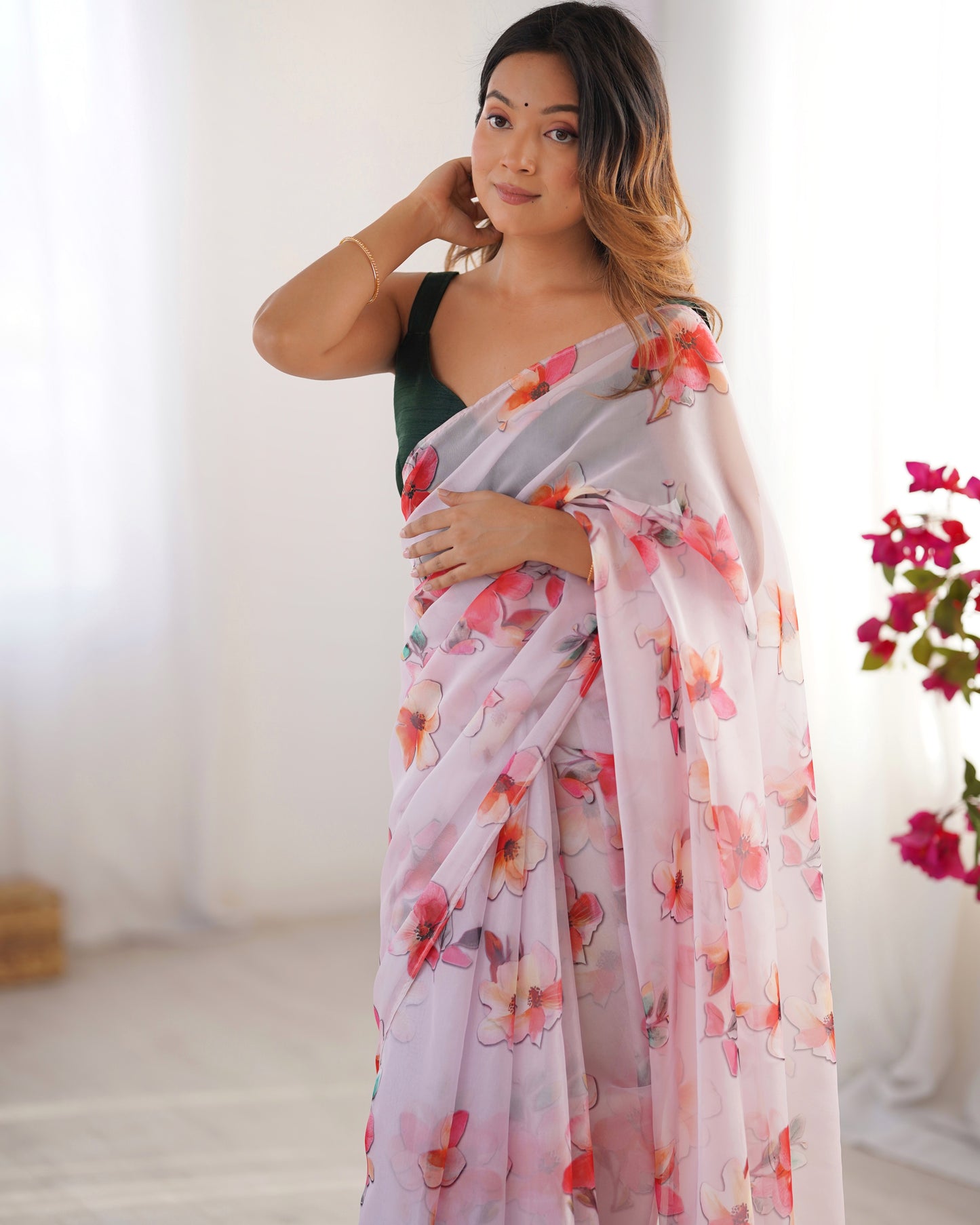 Off white color organza saree with blouse