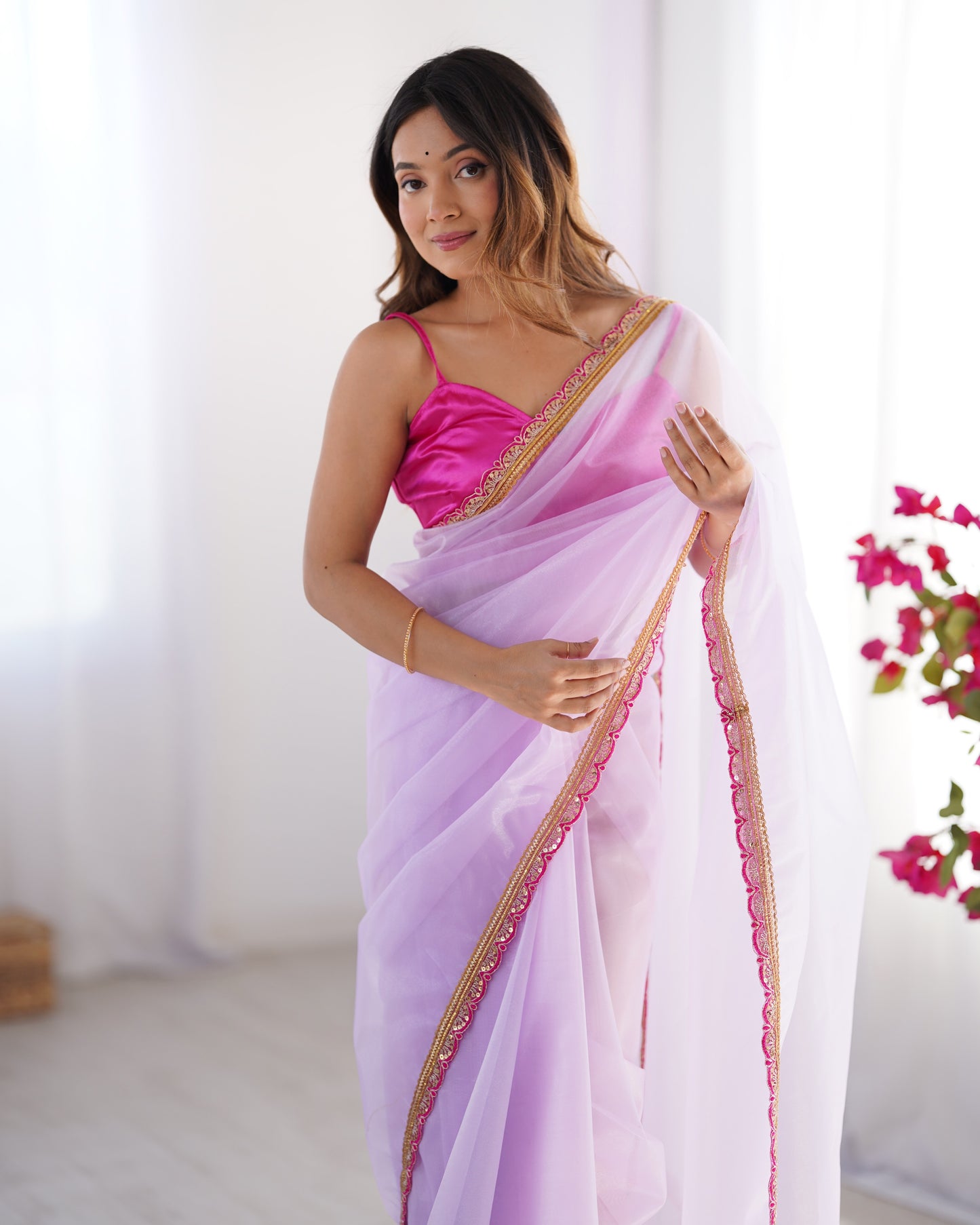 Purple color twill net saree with blouse images