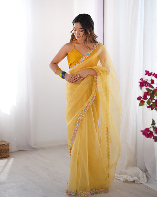 Yellow color jimmy choo saree with blouse online