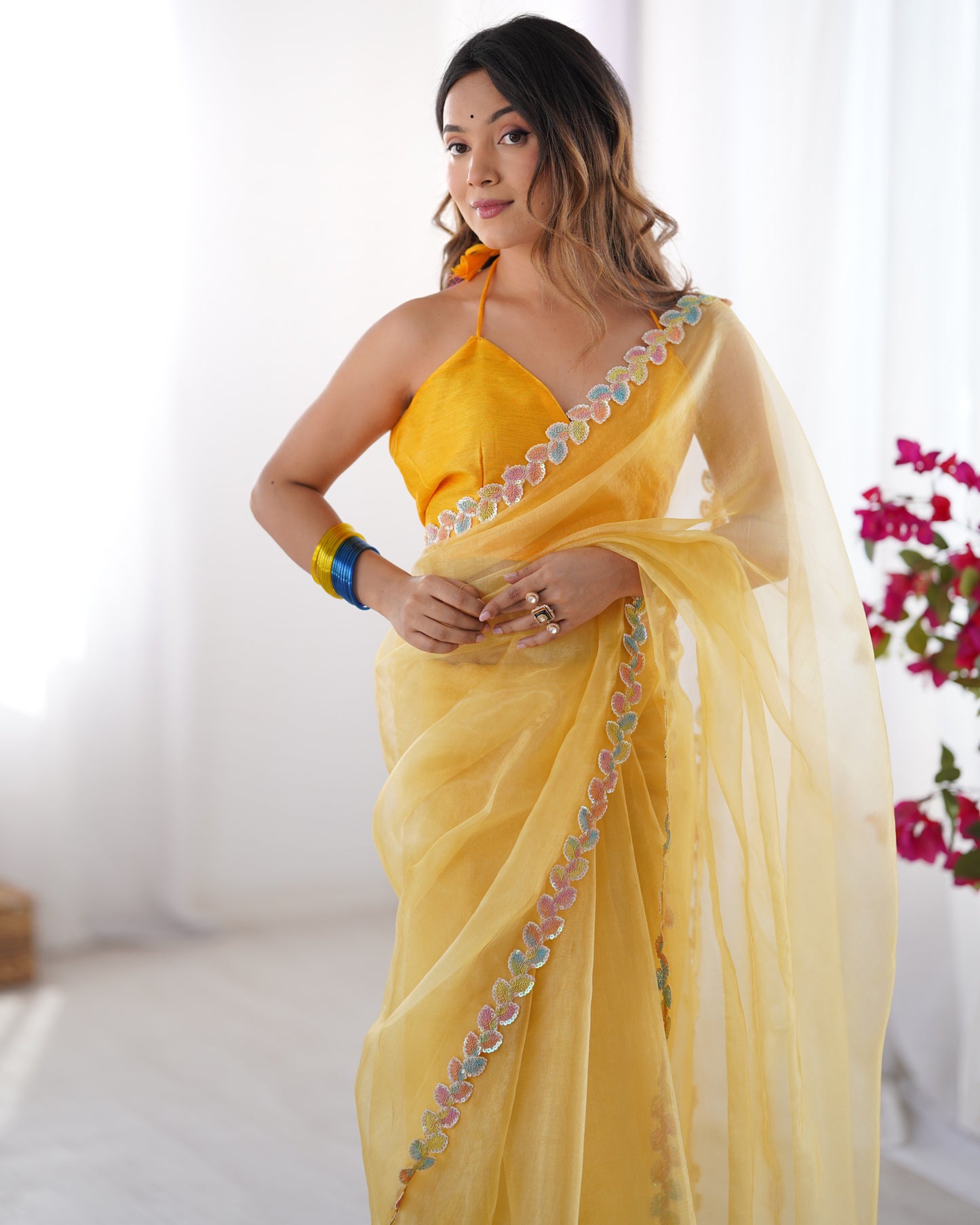 Yellow color jimmy choo saree with blouse images