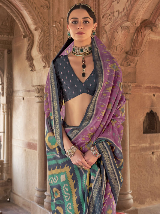 Pink color georgette patola printed saree with blouse