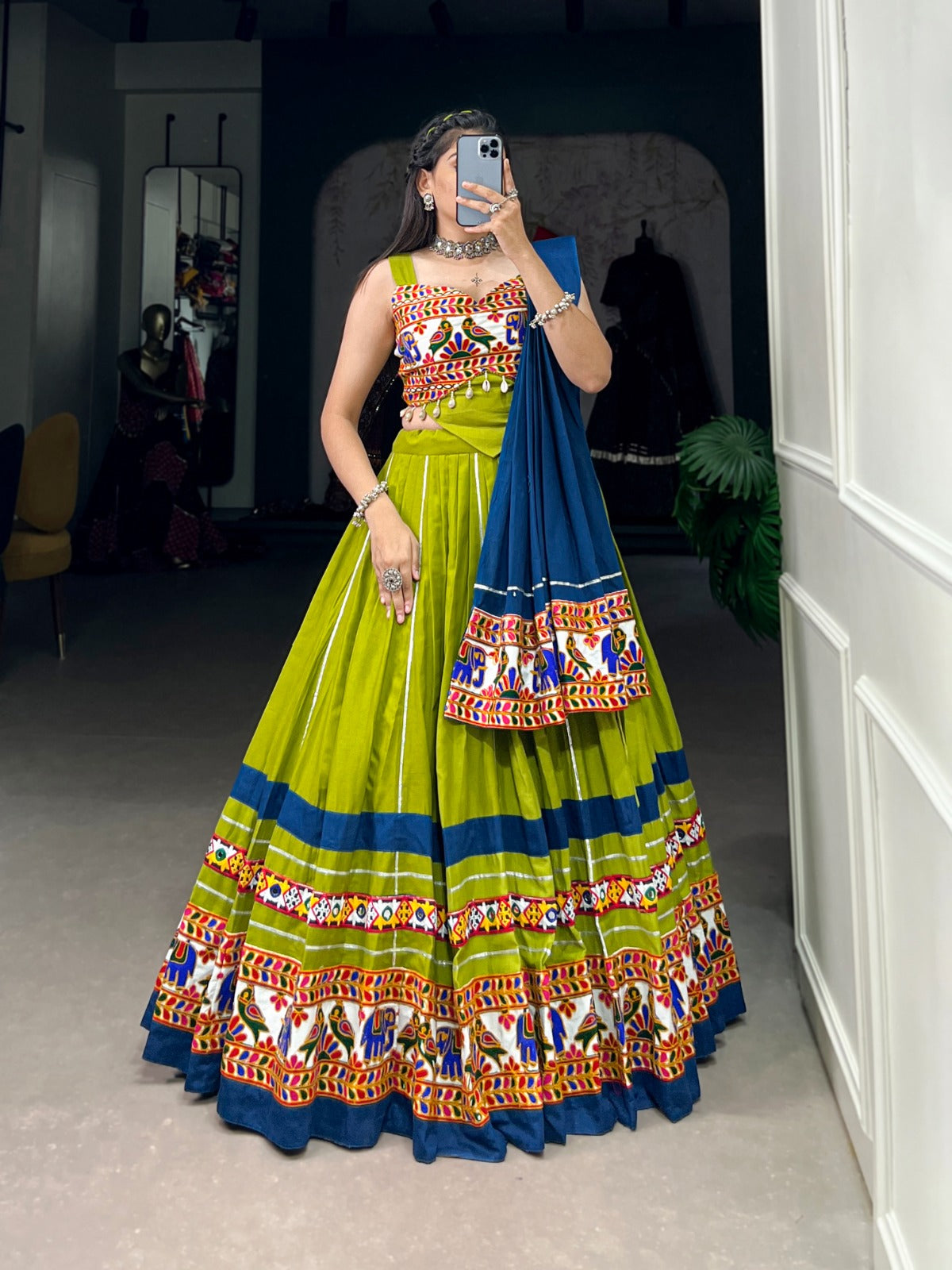 green garba dress Black-Parrot green cotton Navratri lehenga choli with Gamthi work & lace touch up with Parrot Green dupatta details SHOP NOW gotifab.com [ghagra choli, garba outfits, navratri lehengas, navratri collection, navratri chaniya