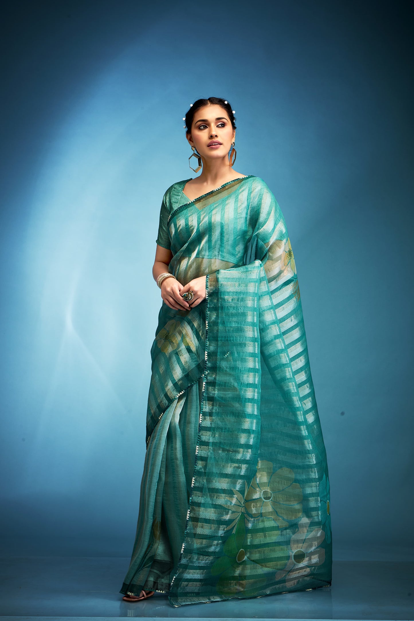 Rama color tissue saree for women price