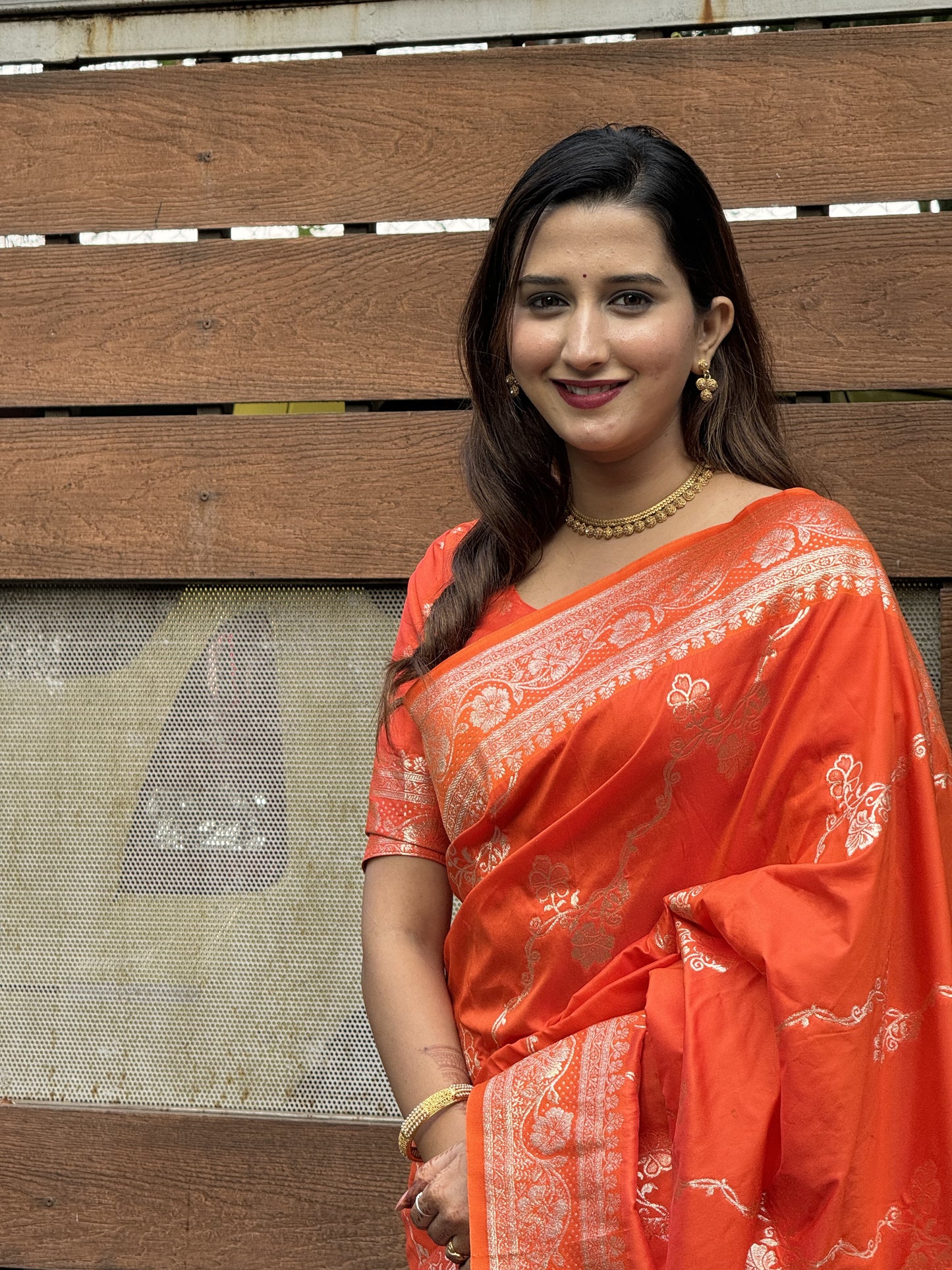 Orange Silk Saree with Golden Border