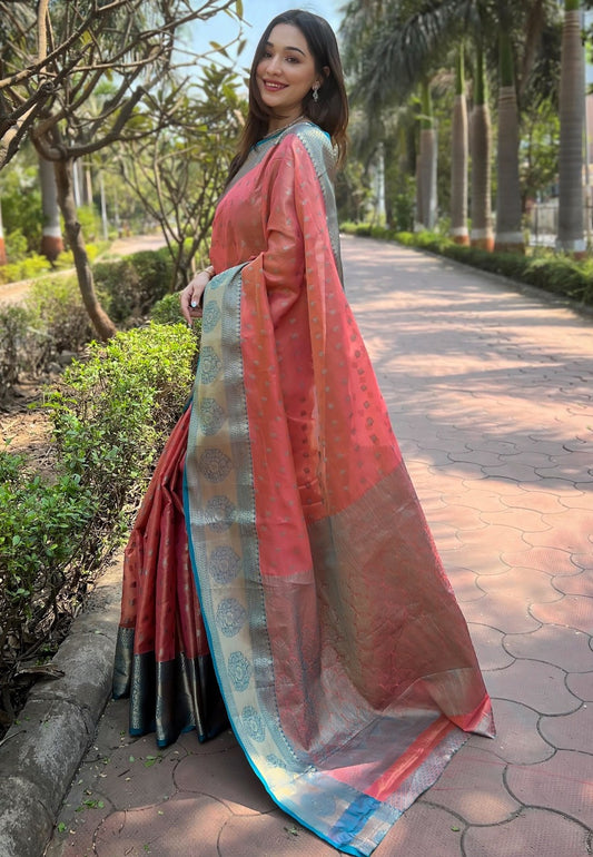Peach color zari weaving tissue saree online