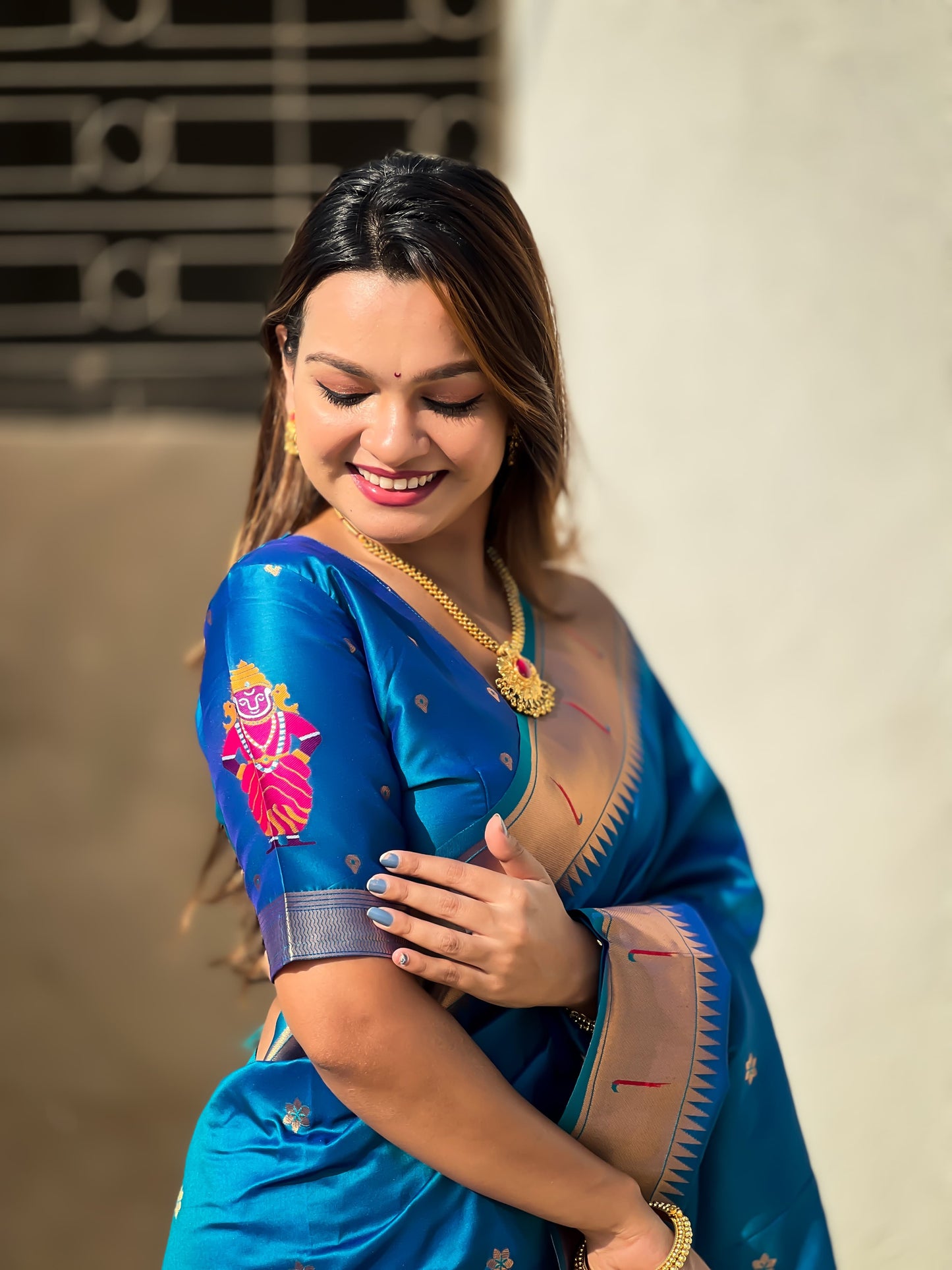 Teal blue color soft silk saree design look