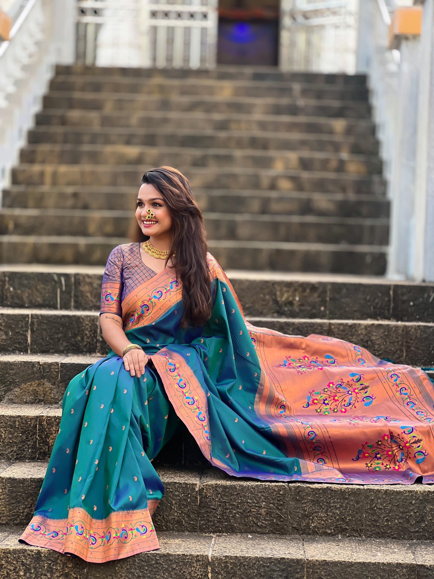 Peacock blue color paithani silk saree for women images