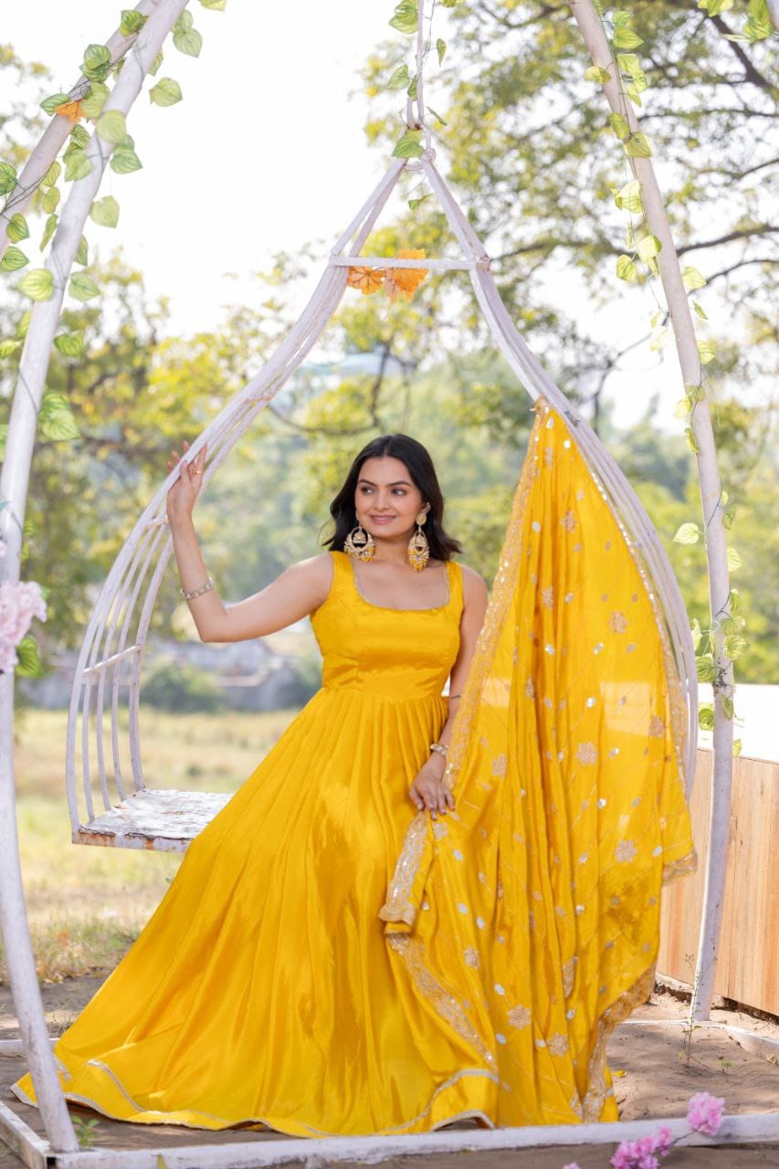 Yellow color chinon silk gown with dupatta