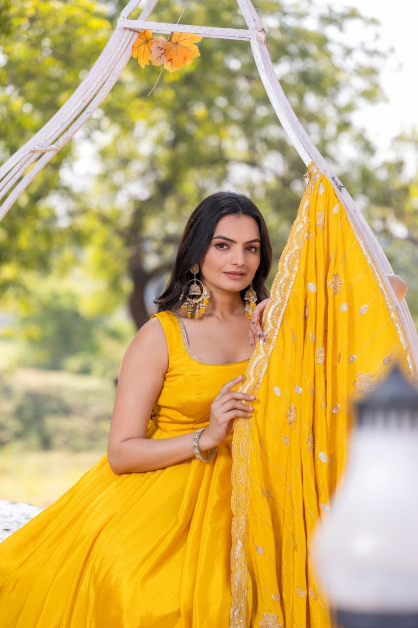 Yellow color chinon silk gown images