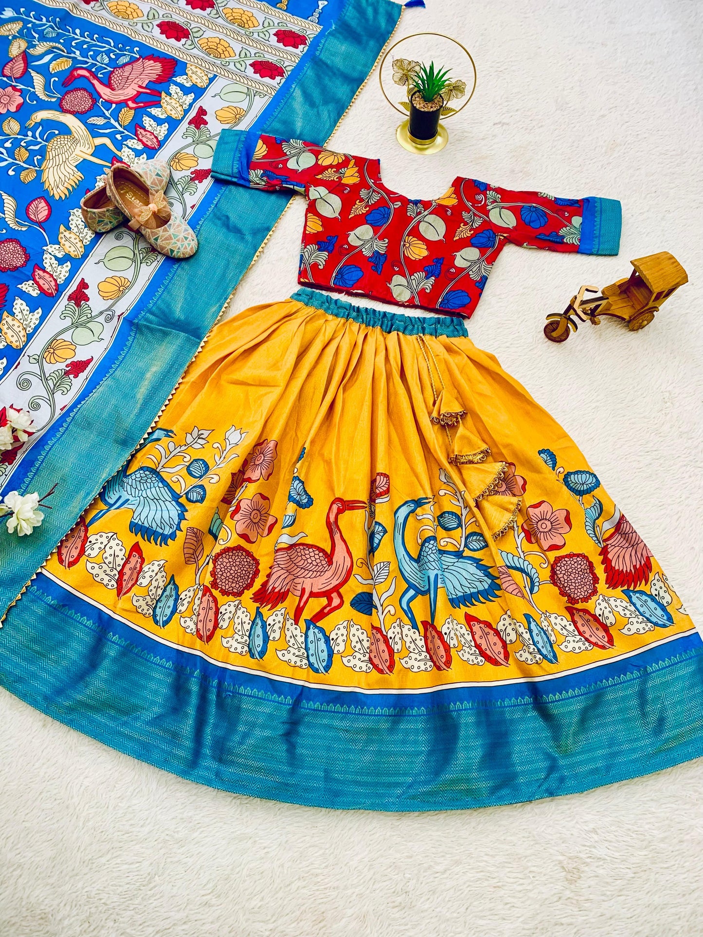 Green color dola silk kalamkari printed lehenga choli with dupatta images