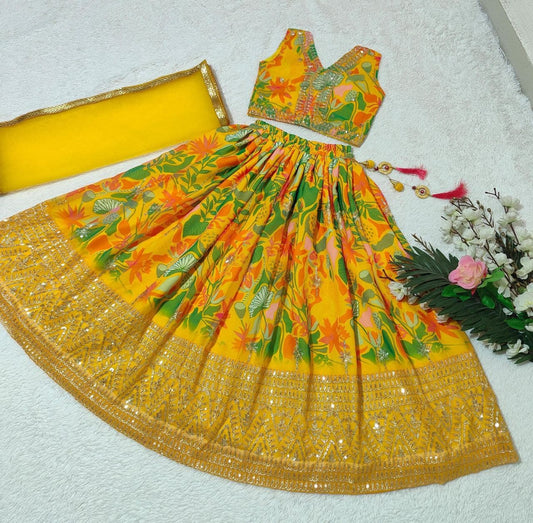 Yellow color georgette kids lehenga choli for wedding