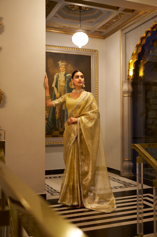 Golden color tissue shimmer saree for women