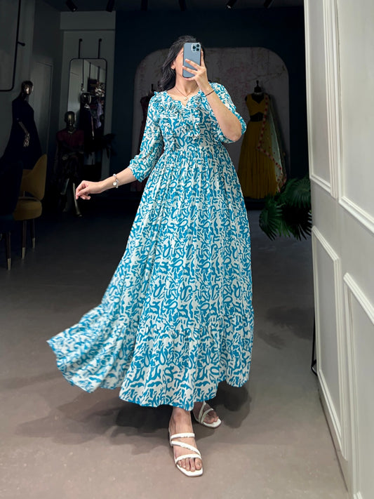 Sky color georgette printed long gown for party