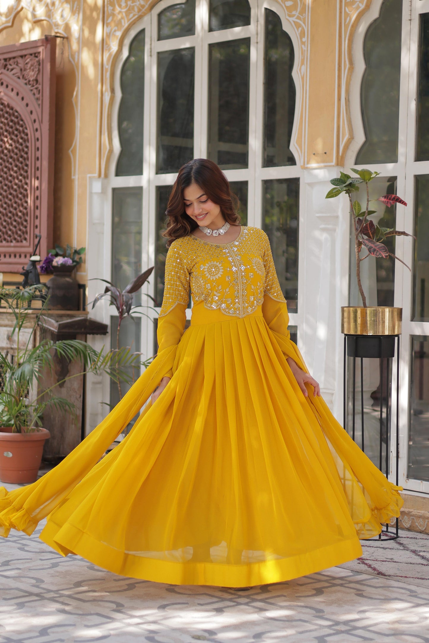 Yellow color faux blooming gown with dupatta images