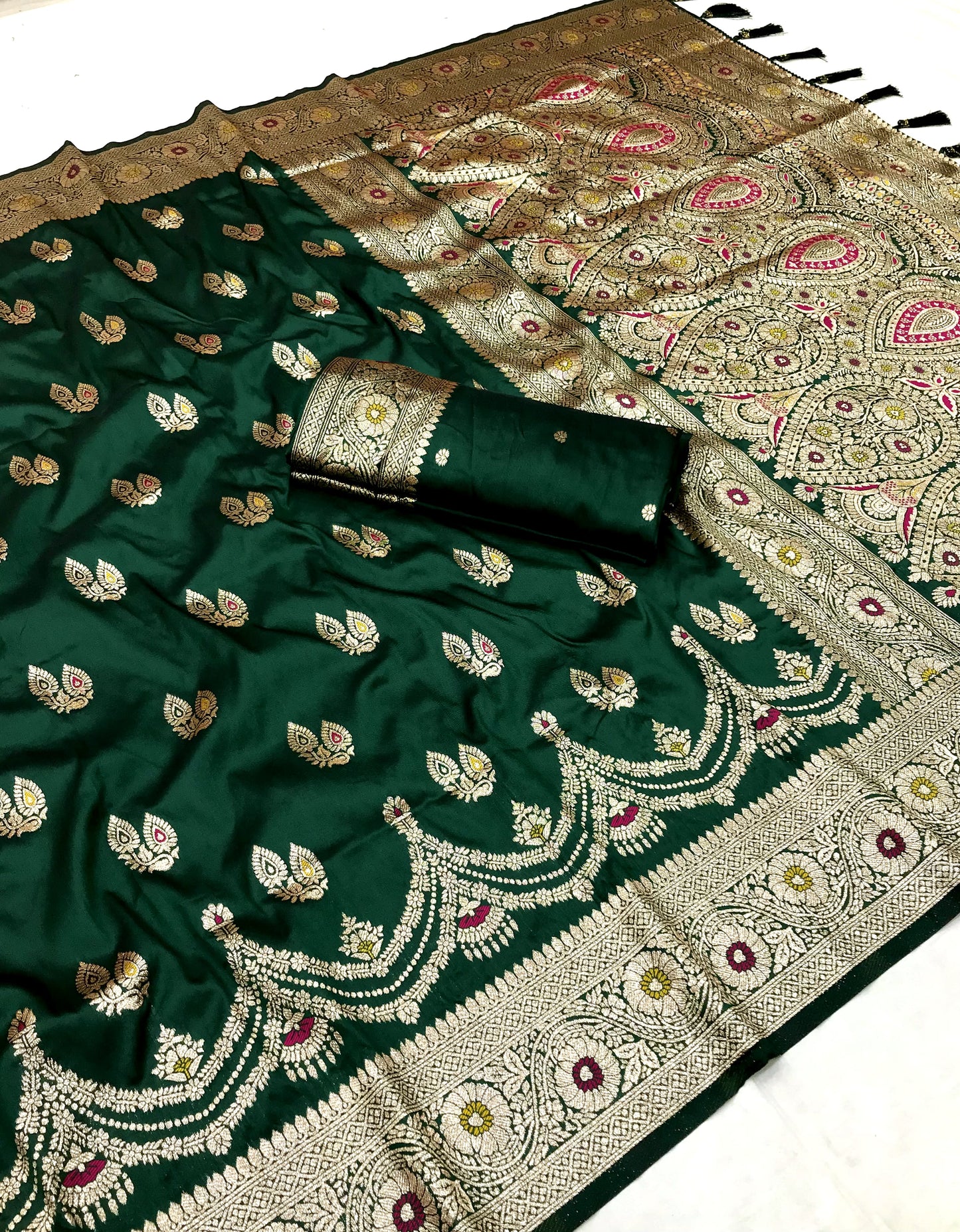 Dark green color banarasi silk saree with blouse