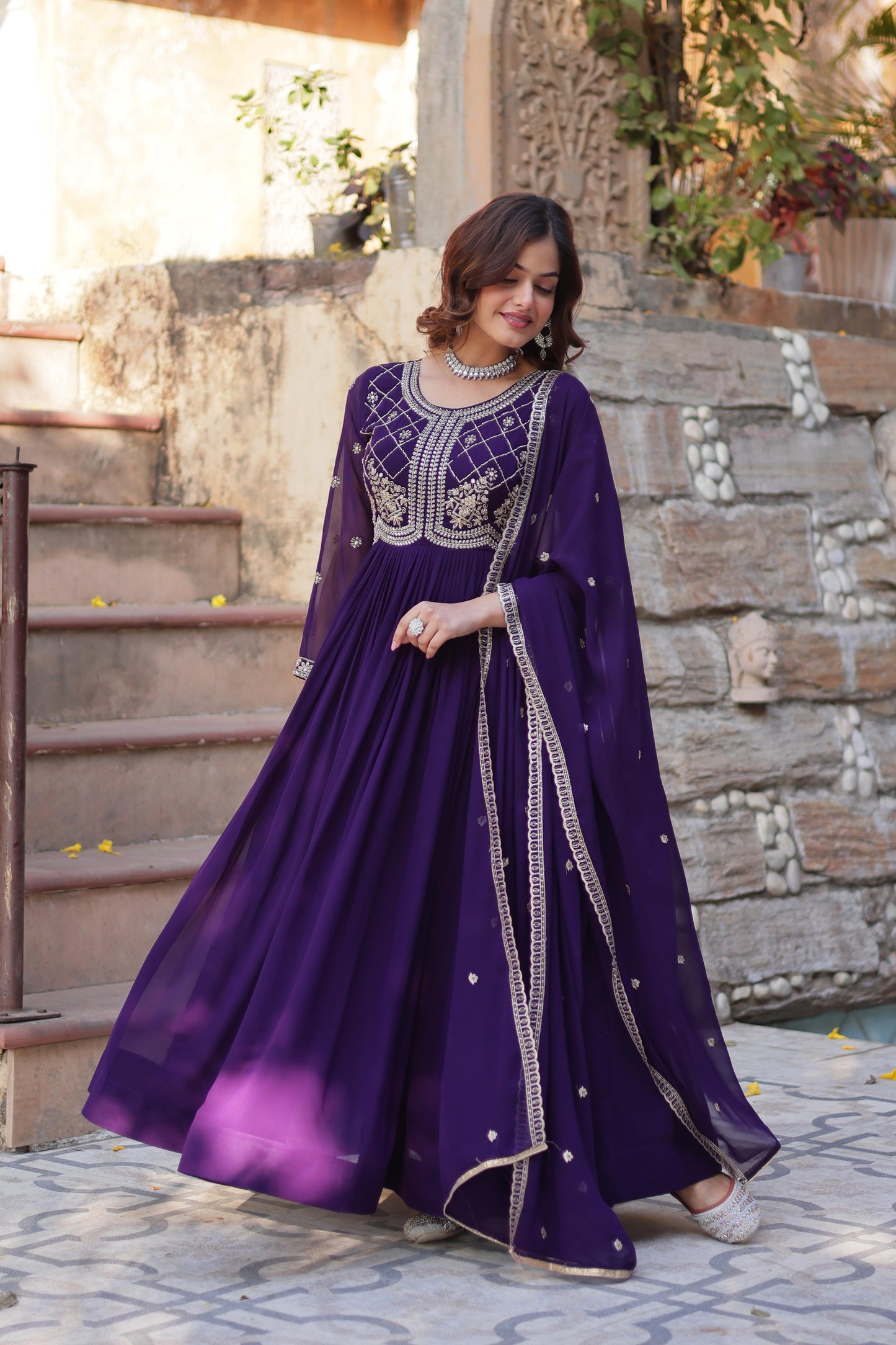 Purple color faux blooming gown with dupatta