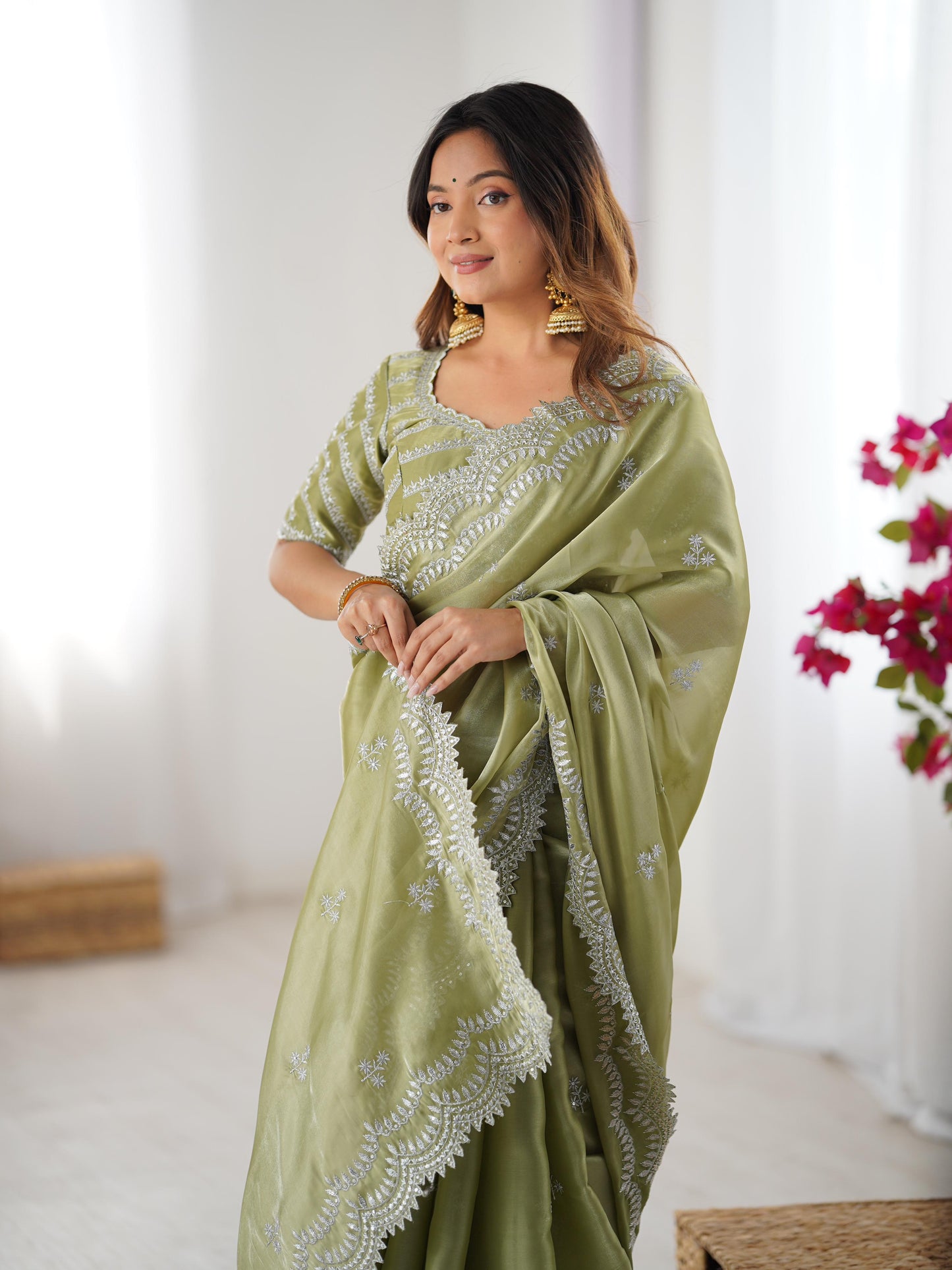 Green color jimmy chu saree with blouse