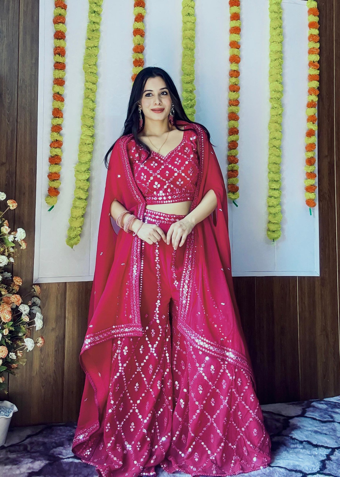 Pink color georgette plazzo suit