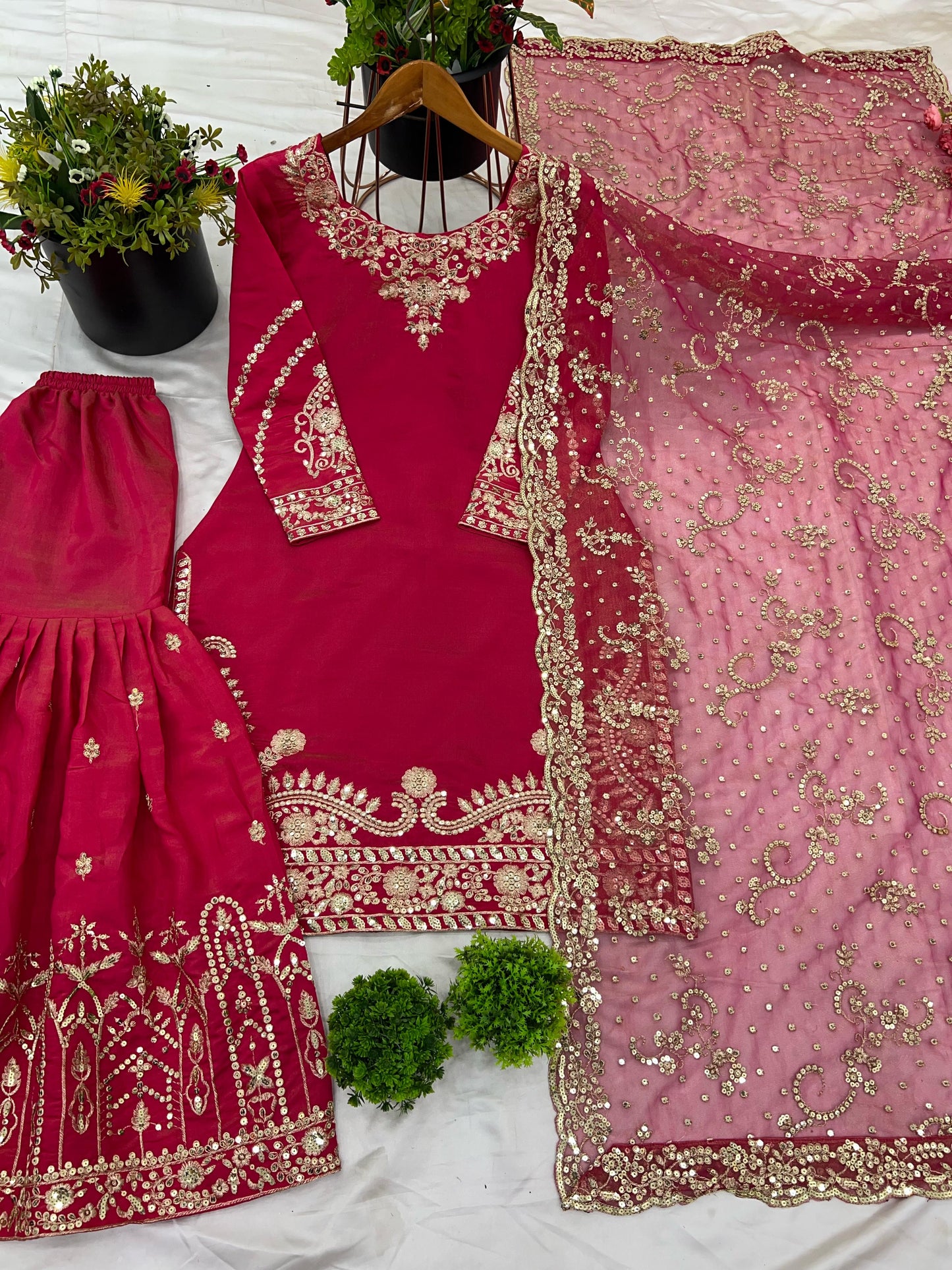 Pink color shimmer silk sharara suit with dupatta price