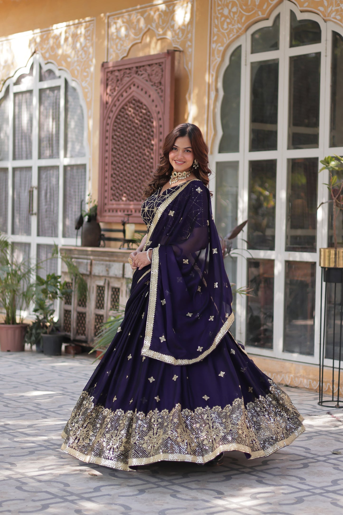 Purple color rangoli silk lehenga choli