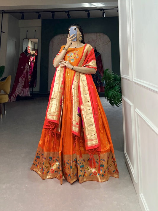 Orange color jacquard silk gown for women