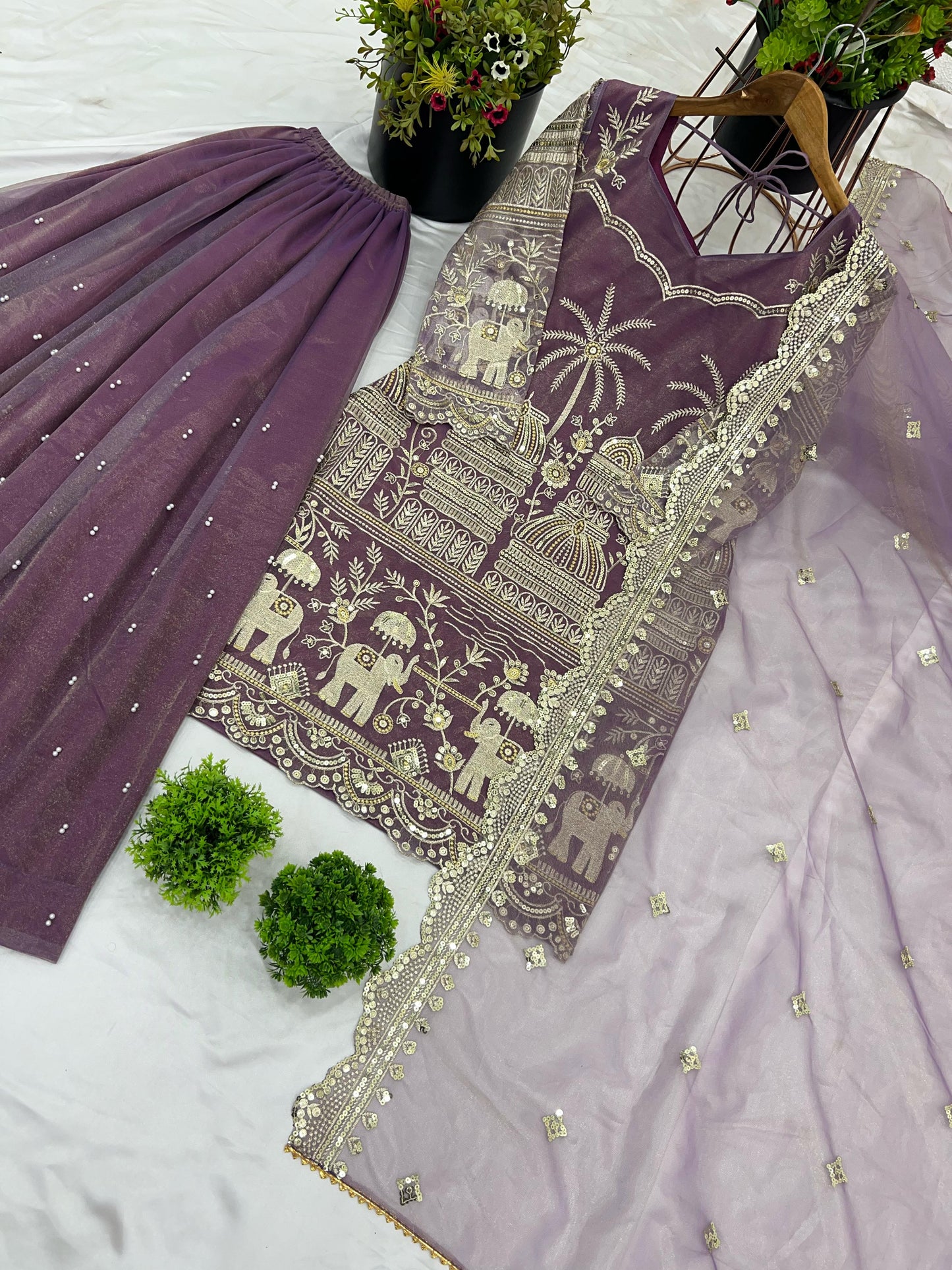 Onion color twill net sharara suit with dupatta