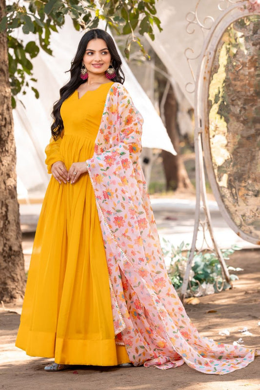 Yellow color soft organza long gown for wedding