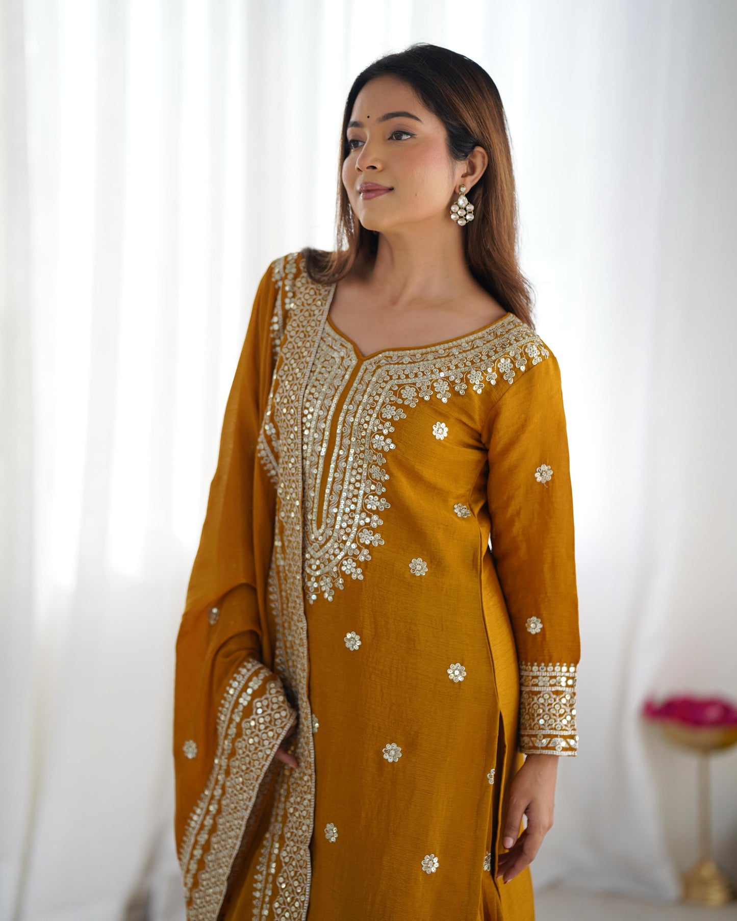 Yellow color chinon silk sharara suit with dupatta for party