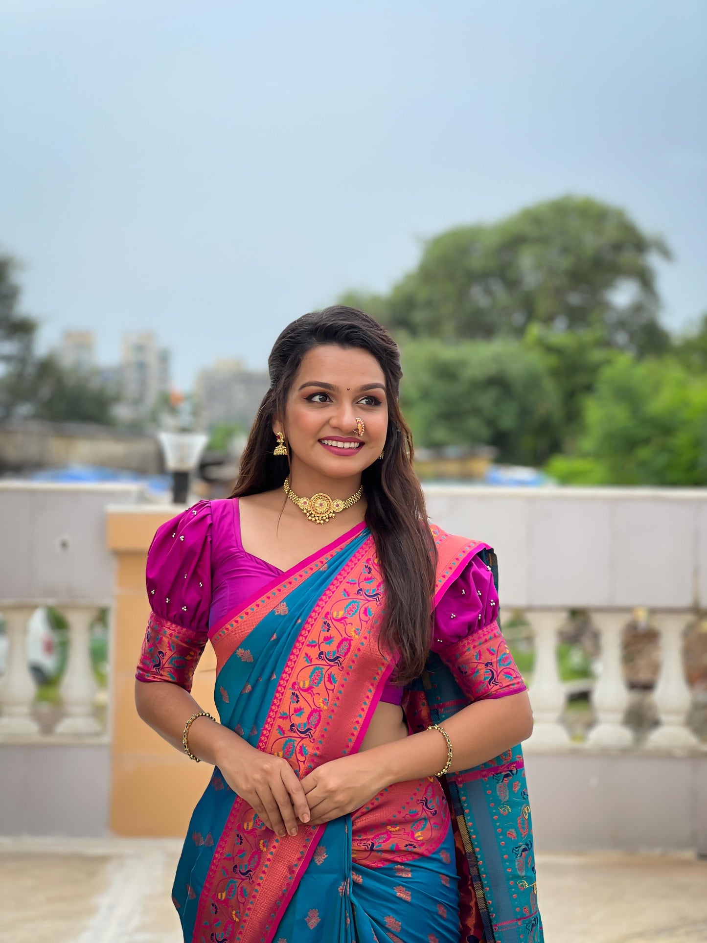 Teal blue color paithani silk saree images