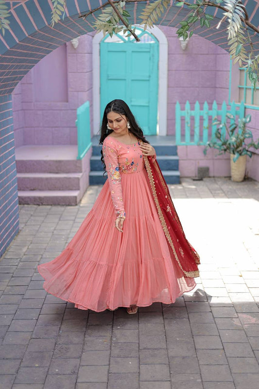Peach gown with red dupatta
