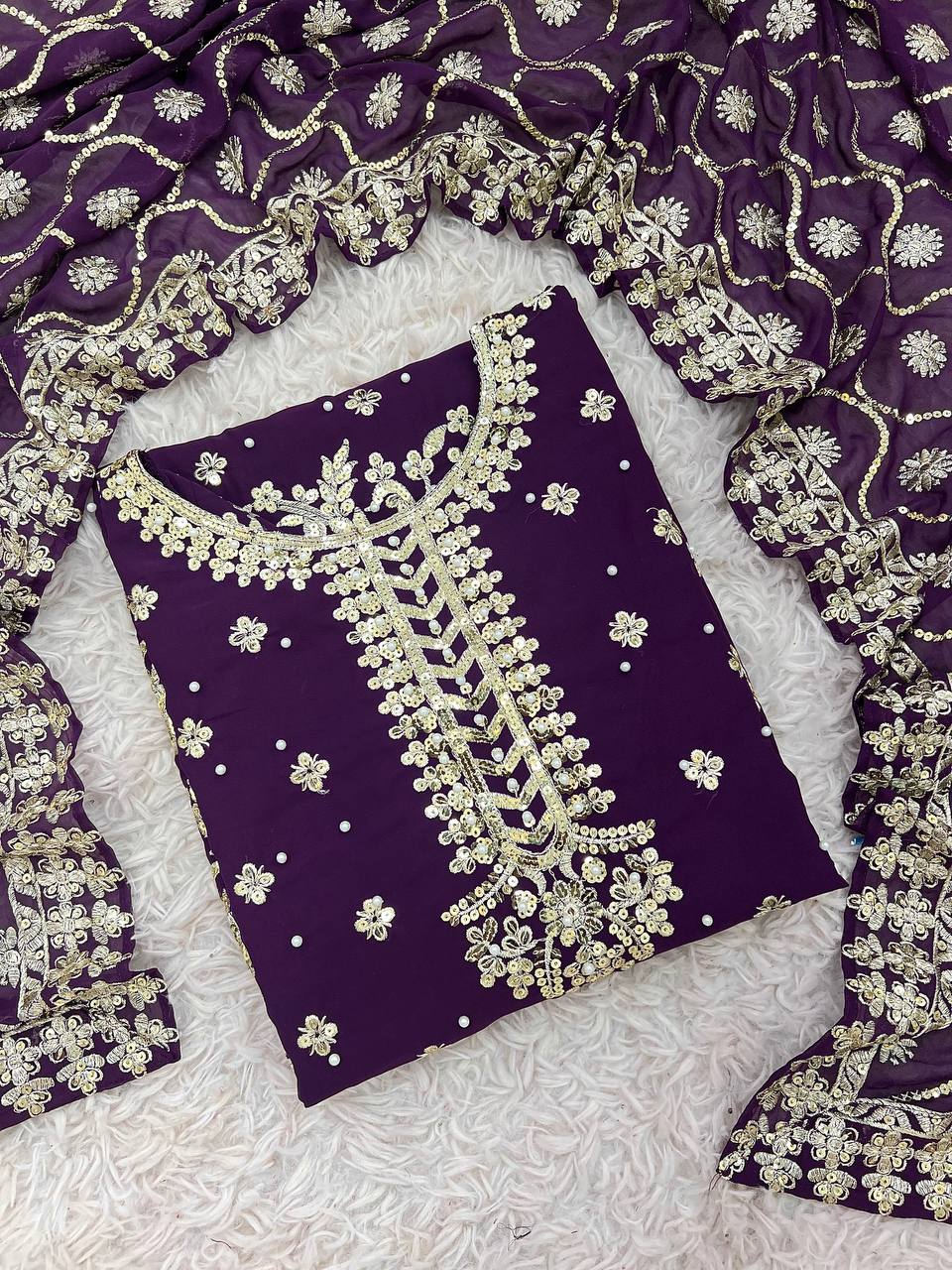 Purple color georgette sharara suit with dupatta images