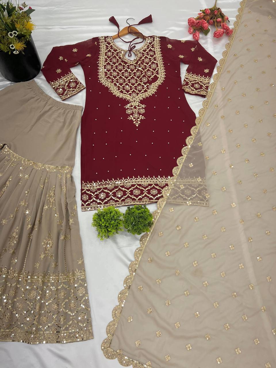 Maroon color georgette sharara suit with dupatta images