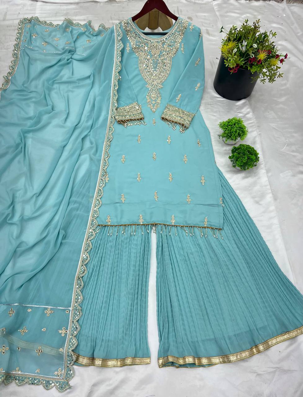 Sky color georgette sharara suit for women